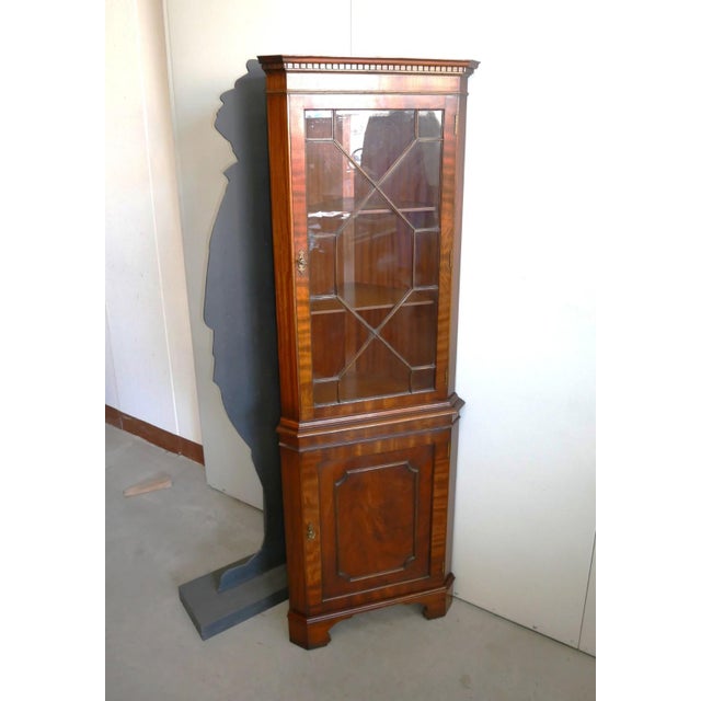 Mahogany veneered corner cabinet, 1950s/60s. origin: great britain marked n.h. Chapman & co. Siesta (historic english...