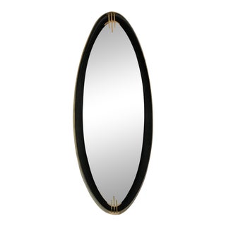 Oval Wall Mirror With Iron Floating and Brass Style Frame. Italy, 1970s For Sale