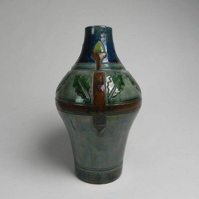 Elegant Art Deco vase from the 1920s, made in the Kortrijk region, an area known for its high-quality Flemish art pottery....