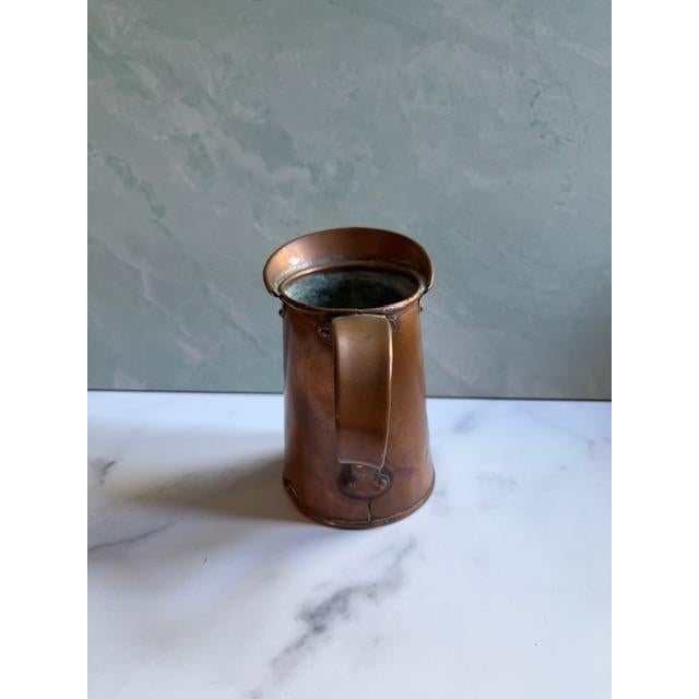 Sweet vintage early 20th century pitcher. Made of copper. Perfect for water, milk, or decorative display. Primitive rustic...
