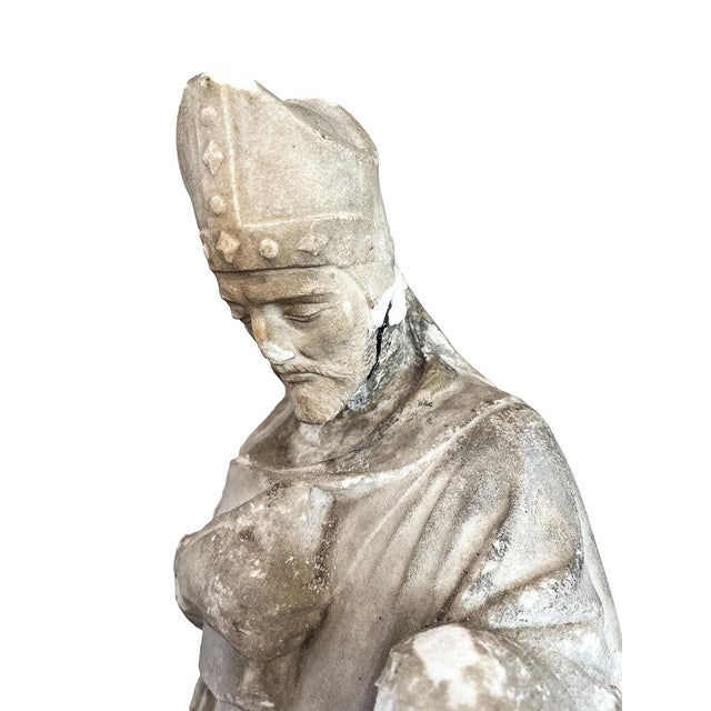 French, hand-carved in the early 1700s. Wear and cracking due to age.