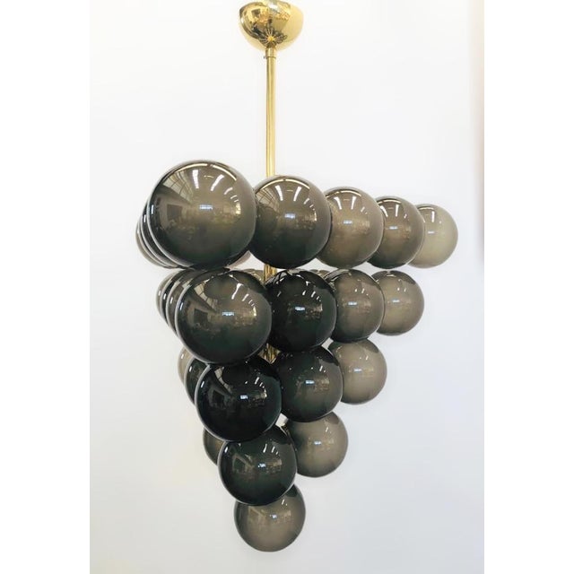 Italian chandelier with frosted smoky Murano glass globes mounted on polished brass finish frame / Made in Italy by Fabio...
