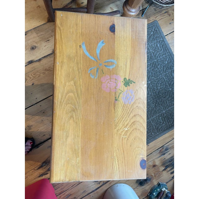 Adorable hand stenciled pine night stand. Perfect for a guest room or child’s room. Stenciled with bows on the drawer...