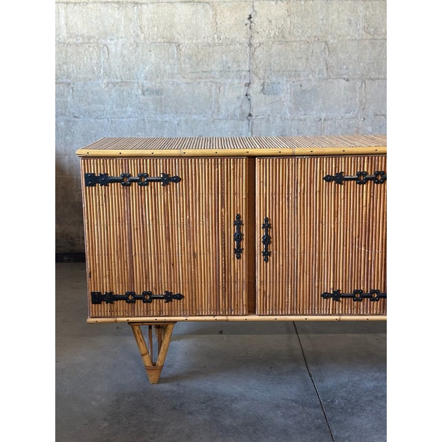 A spectacular piece by Andoux & Minet. Bamboo, split reed and wrought iron. Beautiful construction and a classic shape.