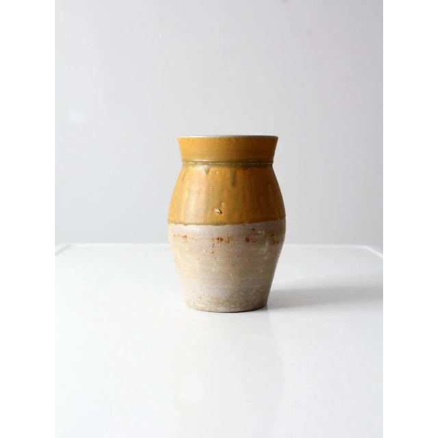 This is a stunning vintage Rockdale Union Stoneware vase circa 1995. The hand-crafted stoneware vase features a salt glaze...