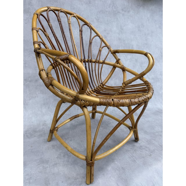 Set of 10 Magnificent Mid-Century French Bamboo and Rattan Lounge Chairs This set of 10 mid-century French lounge chairs...