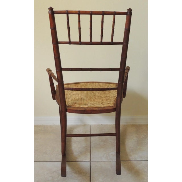 Brown Antique Early 20th Century Rj Horner Faux Bamboo Wood Wicker Seat Child's Rocking Chair For Sale - Image 8 of 11