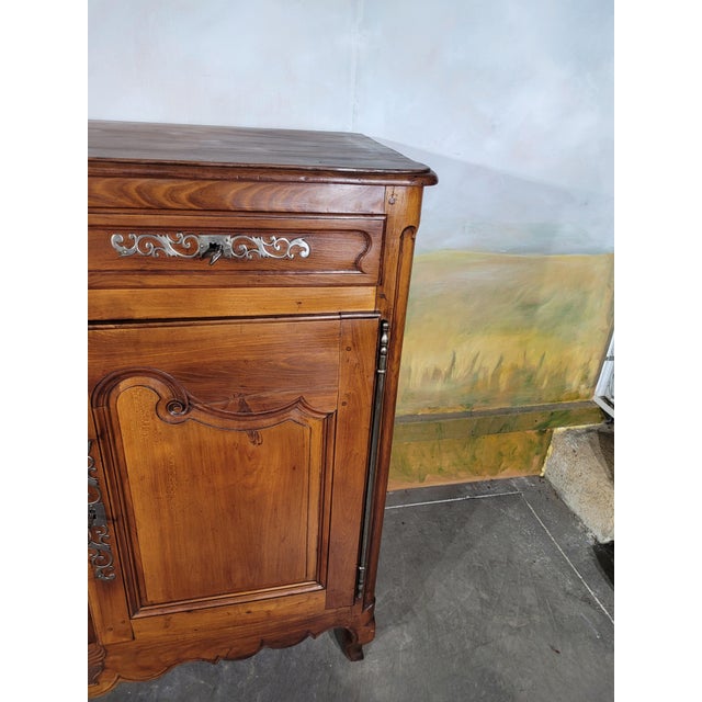 Elegant antique solid wood highboard – regional craftsmanship from western france charming highboard crafted from solid...