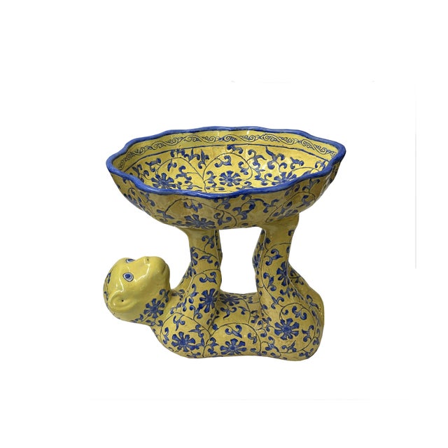 This is a colorful porcelain Monkey holding bowl figure in an oriental style graphic finish which has a mix of charming...
