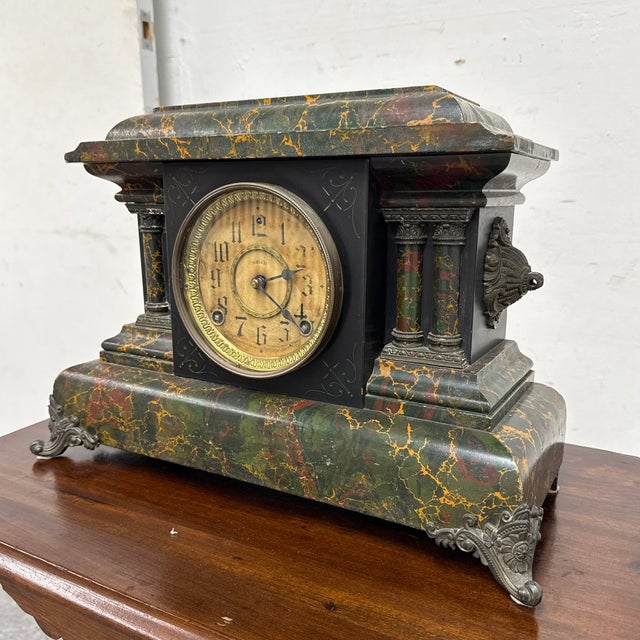 Design Plus Gallery presents a Faux Marble Mantle Clock with Dial Reading Welch. The mantle clock follows with Victorian...