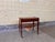 This beautiful vintage Scandinavian side table in teak combines elegant design with practical functionality. The table...