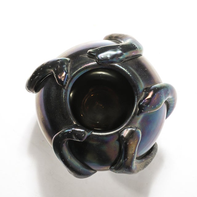 This striking Mid-Century Modernist hand-blown Murano glass vase, crafted in Italy circa 1980, is a testament to Murano's...