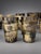 An assembled collection of twenty-four horn drinking beakers, mostly British, predominantly nineteenth century, with...