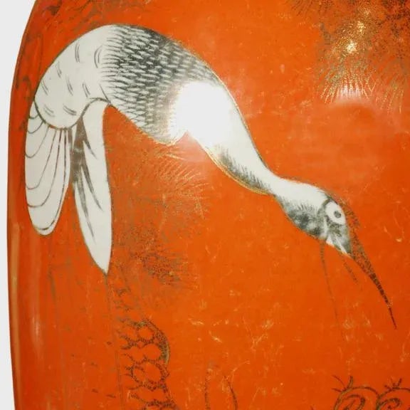 This elegant, phoenix tail form dates to China's bronze age, but the vase was made in 1920 in China's Zhejiang Province....