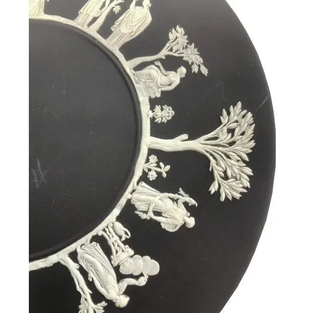 A classic and timeless vintage Wedgwood plate that feels particularly modern in matte black and white. This plate has a...