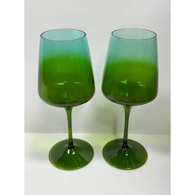 This lovely pair of wineglasses features incredible colors and would be a wonderful addition to any room. Handcrafted in...