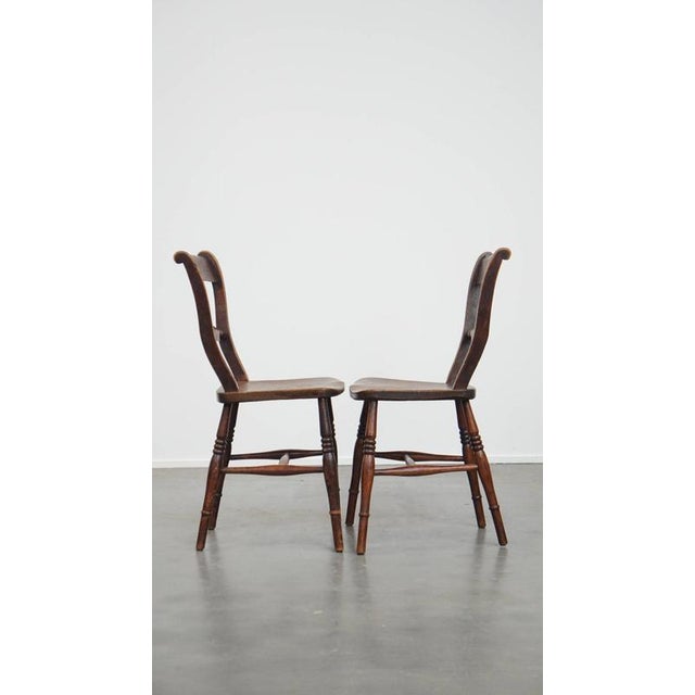 Offered this elegant set of 2 antique English chairs with beautiful woodwork and warm colors. This great set of 2 antique...