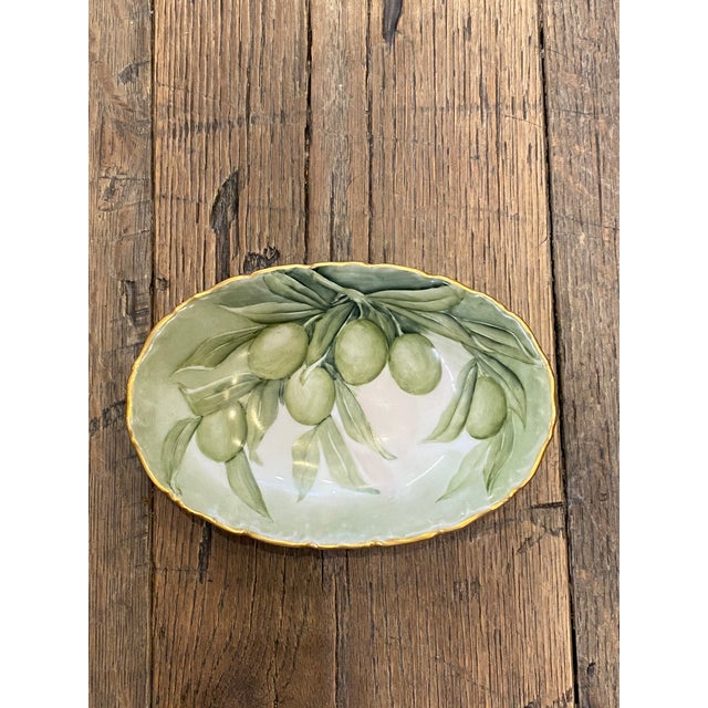Elegant French Limoges porcelain serving dish, beautifully hand-painted with a naturalistic olive branch in soft shades of...