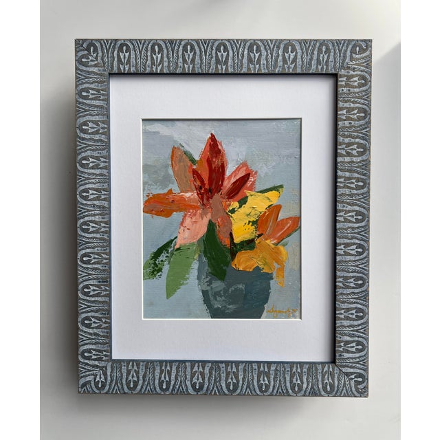 Bright and vivid painting of orange Tiger Lilies in a blue vase in a ready to display vintage blue carved wood frame....