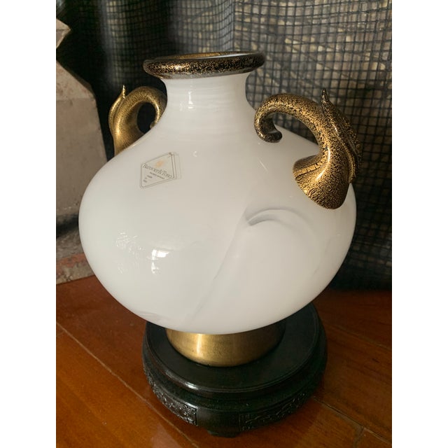 Ercole Barovier white Murano glass vase with black and gold layered handles, vase lip, and base. Hand blown translucent...