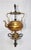 An antique Art Nouveau brass tea kettle and burner on iron stand. Tea kettle is stamped S&C Company which was standard for...
