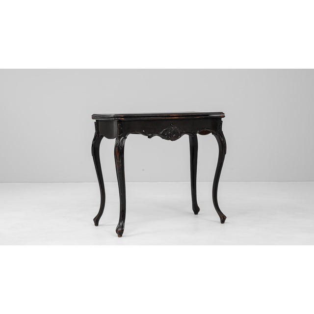 This 1880s French side table exemplifies the elegance of late 19th-century craftsmanship with its graceful cabriole legs...