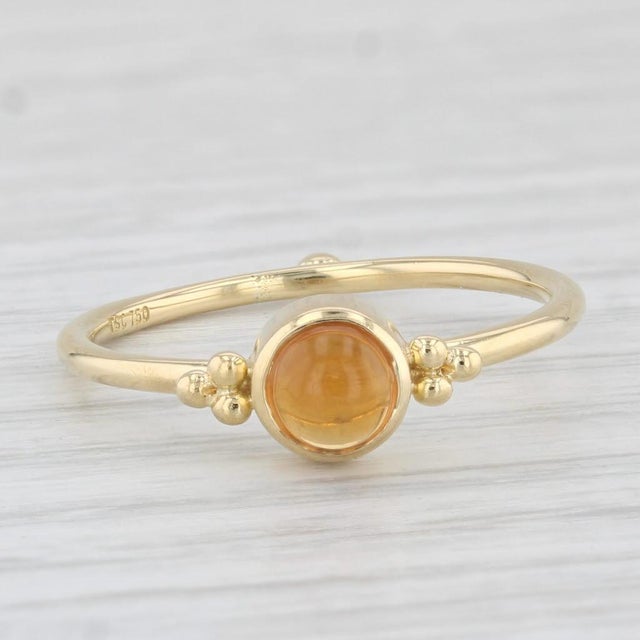 Gemstone Information: - Natural Citrine - Size - 5 mm Cut - Round Cabochon Color - Orange Treatment - Heated Metal: 18k...
