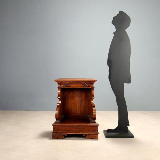 Baroque style prie-dieu crafted in the 20th century using antique woods, particularly walnut. The piece features a shaped...