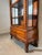 Beautiful antique display cabinet featuring elegant barley twist columns and a warm, rich wood tone. This refined vitrine...