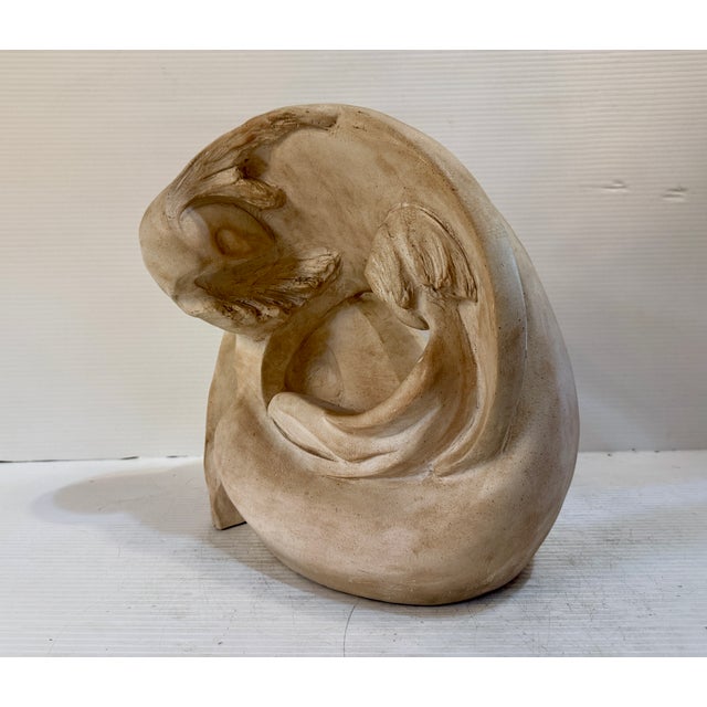 This vintage statue is titled "Beginnings", by David Fisher for Austin Productions. The statue depicts a mother and child...