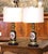 Elegant and richly decorated, this pair of antique French Napoleon III lamps was originally made as oil lamps and later...