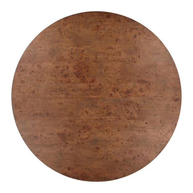 Round modern yet warm coffee table with a striking mix of natural character and sophisticated contrast. Features a pairing...