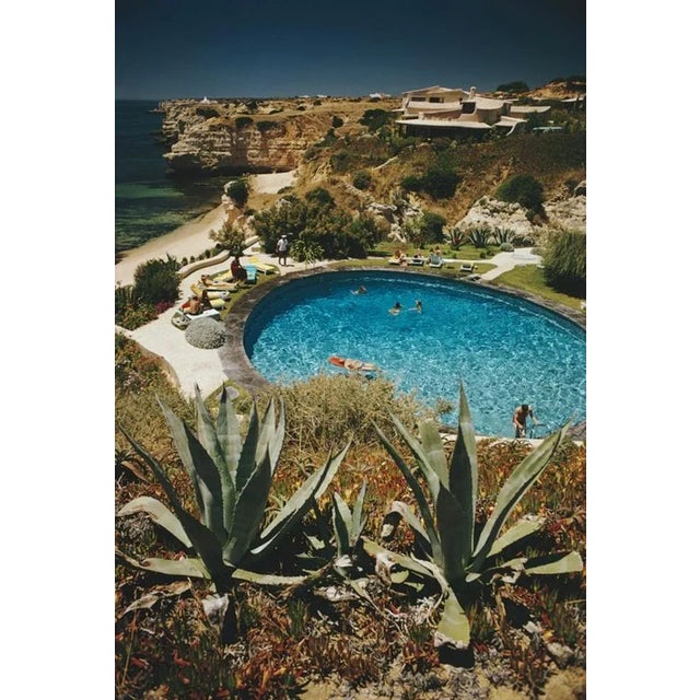 Algarve Hotel Pool 1970 by Slim Aarons Slim Aarons Limited Estate Edition Guests in the pool at the Algarve Hotel, the...