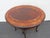 This elegant Center Table is made out of wood, solid wood, walnut, flame veneer, and veneer. The Table has French style...