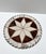 Handcrafted vintage round trivet or placemat made from genuine cowhide leather. The patchwork design forms an eye-catching...