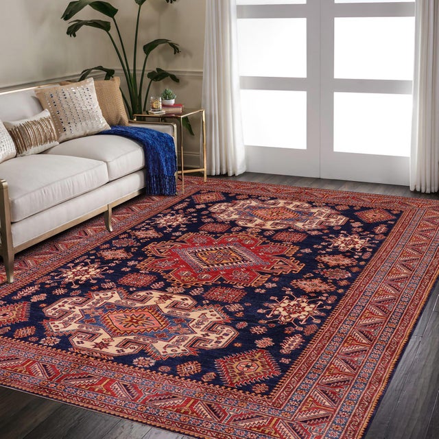 Enhance your home with this exquisite hand-knotted Super Kazak rug, crafted from fine hand-spun wool and dyed with all-...