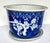 Late 1800s Chinese hand painted jardiniere with saucer. Overall traditional prunus blossom design with upper and lower...