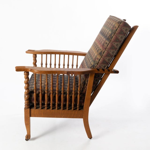 Circa 1890s beautiful chair with barley twist supports and carved paw feet, nicely upholstered.