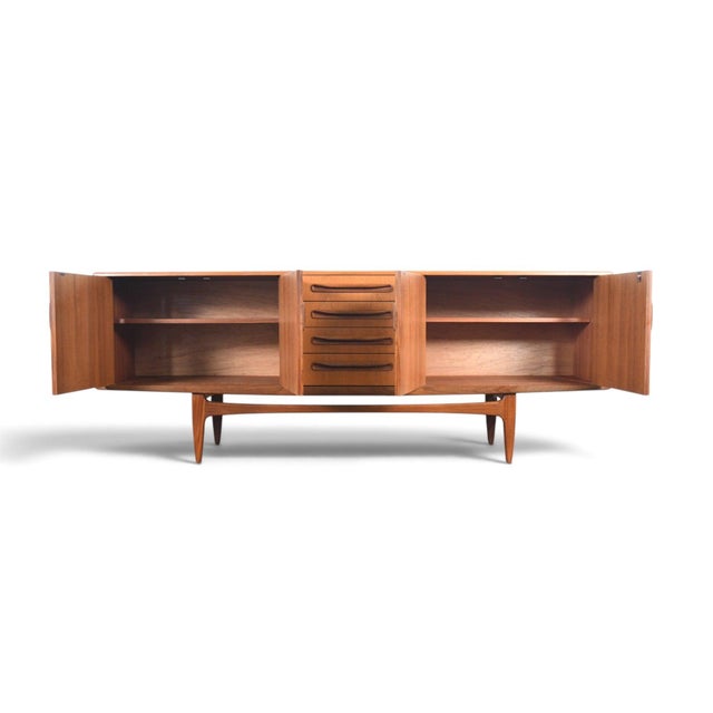 This large credenza is from G Plan's Fresco range, designed by Victor B. Wilkins and produced in England during the 1960s....