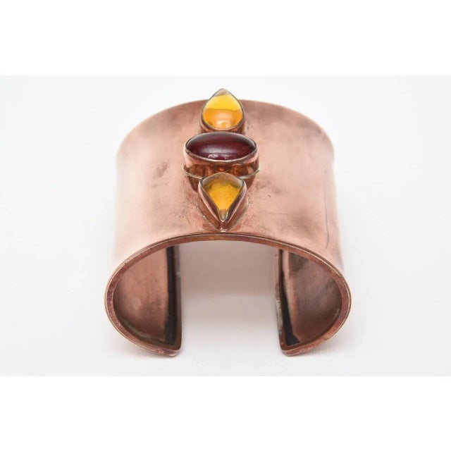 This is part of Chairish’s Costume Jewelry assortment. This arresting wide cuff bracelet made from copper and 3 glass...