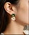 Elegant 14K yellow gold vermeil silver drop earrings featuring 2 natural oval green amethysts paired with 2 lustrous...