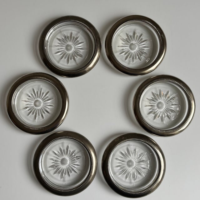 Classic vintage set of Italian silverplate & crystal coasters in a starburst pattern, circa 1970. Each bears the maker's...