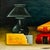 This still life oil on canvas is a great anchor for a Dark Academia inspired space. Features a stack of leather-bound...