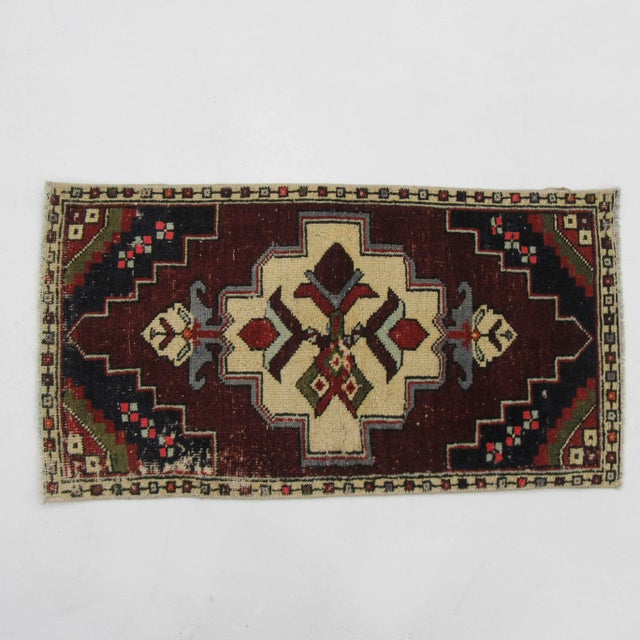 Vintage handknotted decorative mini rug from Konya region of Turkey. Approximately 50-60 years old. In very good condition.