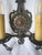 Iron two arm sconce that holds single bulb in each. Ready to be hard wired into the wall. Wiring is in good working order....