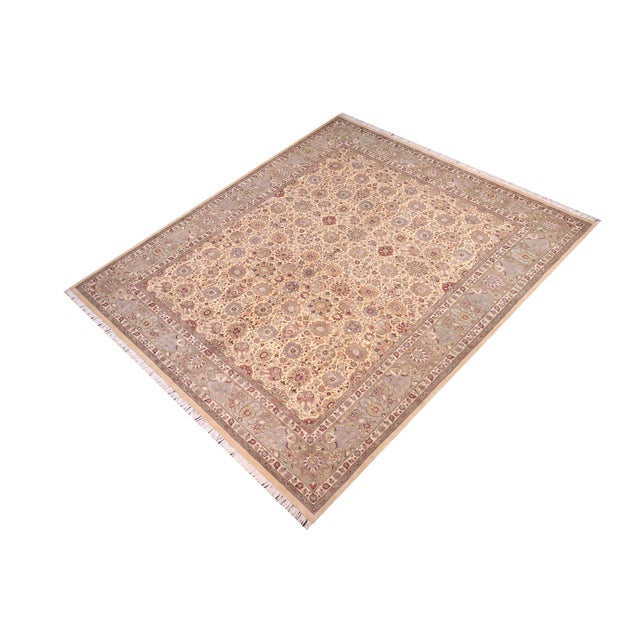 Designed with mesmerizing intricacy and gorgeous color palette, this hand-knotted masterpiece demonstrates the beauty and...