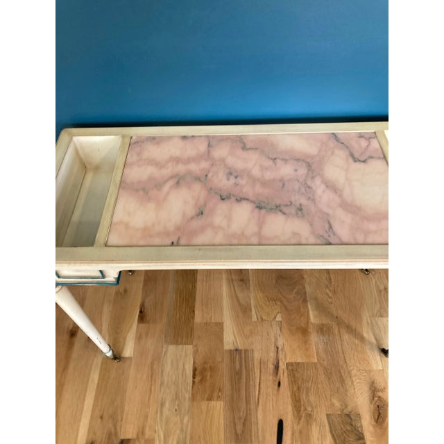 This beautifully detailed Italian console table blends classic lines with whimsical color. Featuring hand-painted white...