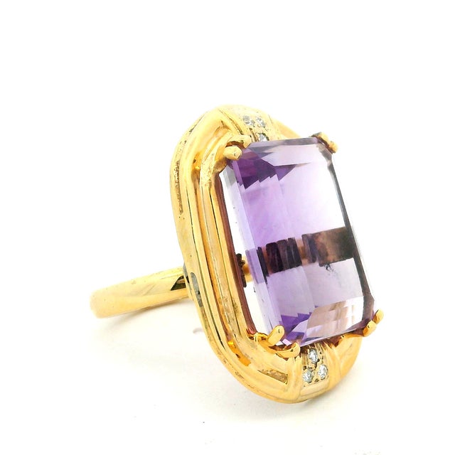 A striking example of Italian jewelry design, this circa 1980 cocktail ring is handcrafted in 14 karat yellow gold and...