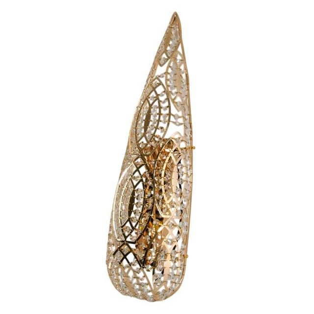 This Steel and Crystal Arabesque Wall Lamp from VGnewtrend is an exceptional example of contemporary Italian luxury...