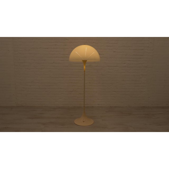 This is a true design classic and you probably recognise it as a vintage lover! This vintage Panthella lamp was designed...